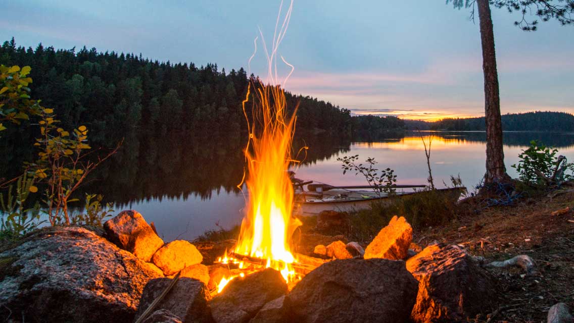 Campfire by a lake